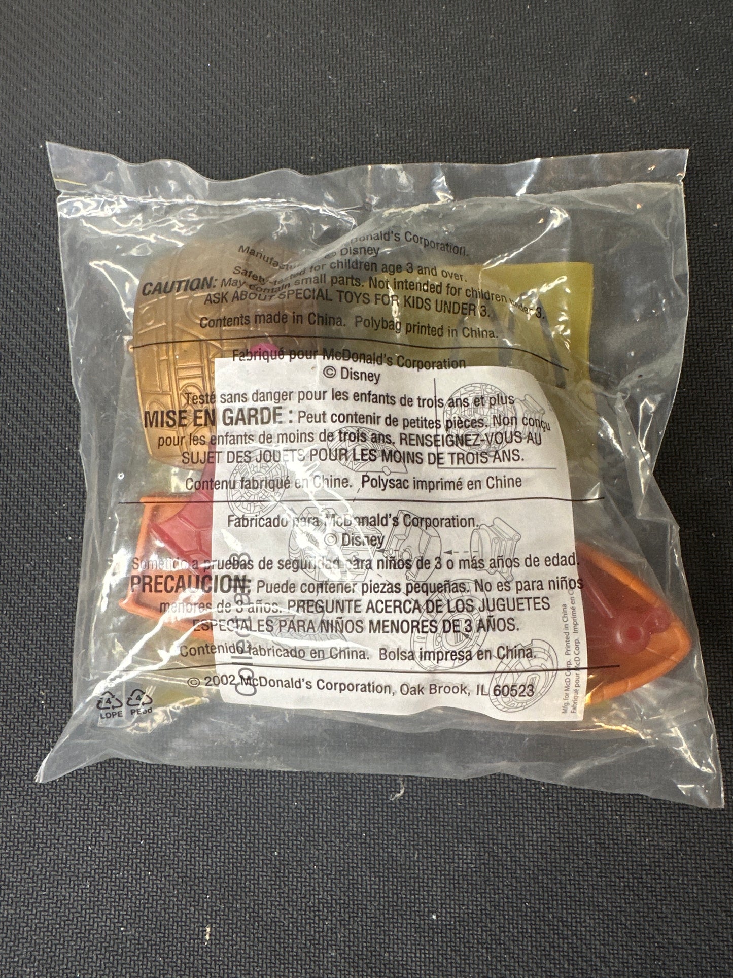 McDonalds Happy Meal 2004 Treasure Planet No. 1Jim Hawkins Action Figure with Puzzle Accessory