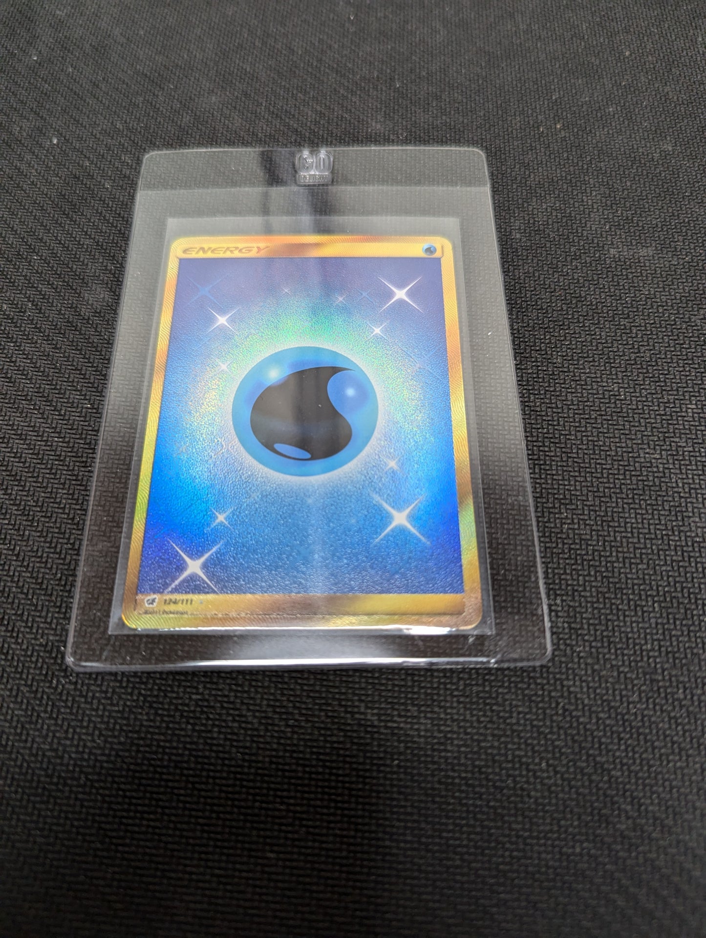 Pokémon TCG Water Energy Crimson Invasion 124 out of 111 Holo Secret Rare Front